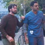 Transplant Season 3: Theo and Bash stand on a street shocked